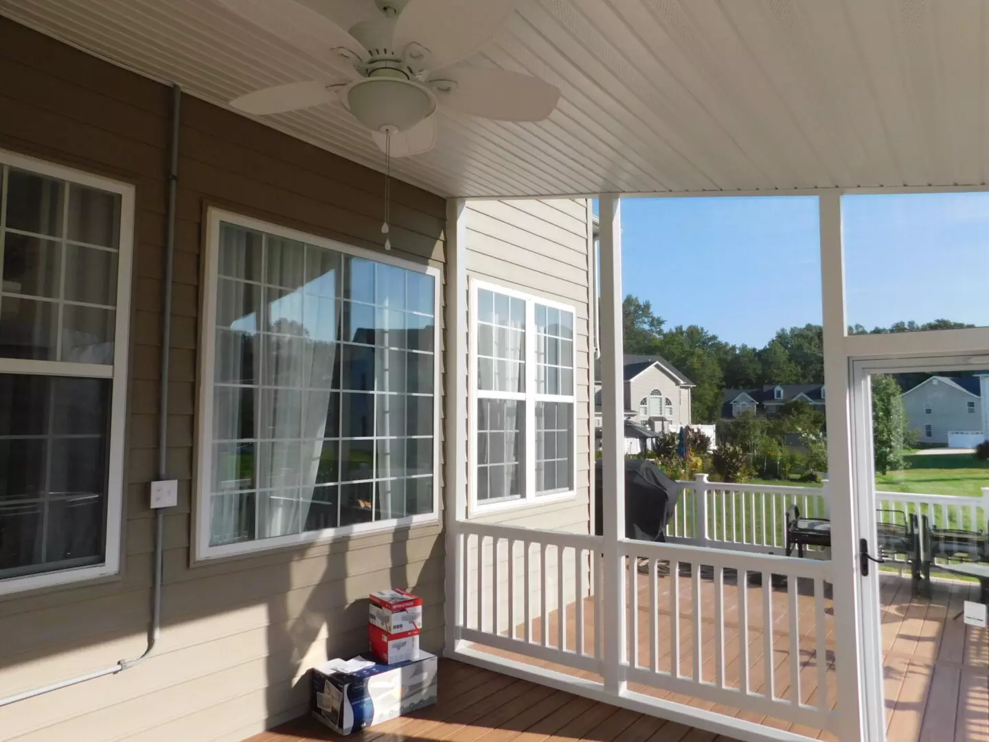 View of a glass-enclosed deck from the inside