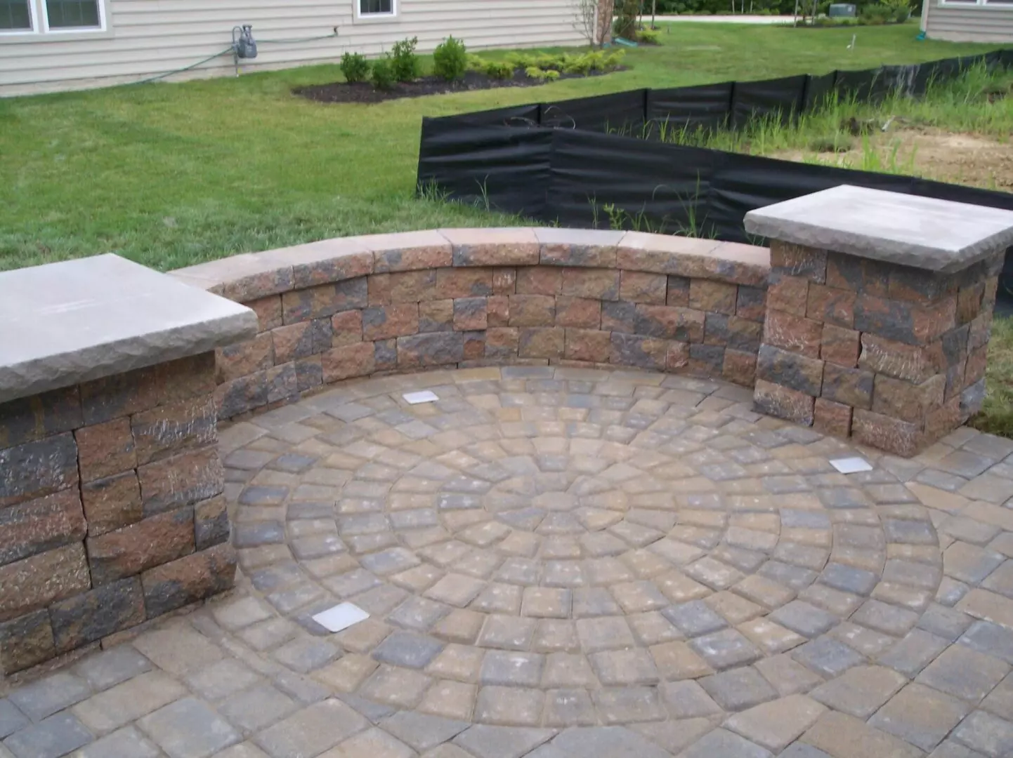 A stone deck with a circular design