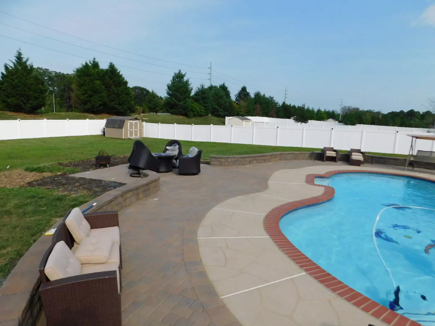 Poolside with a bunch of lounge chairs