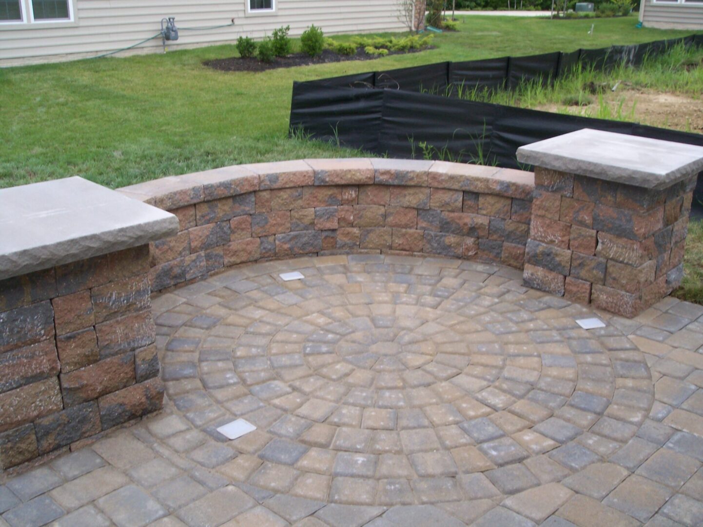 A stone deck with a circular design